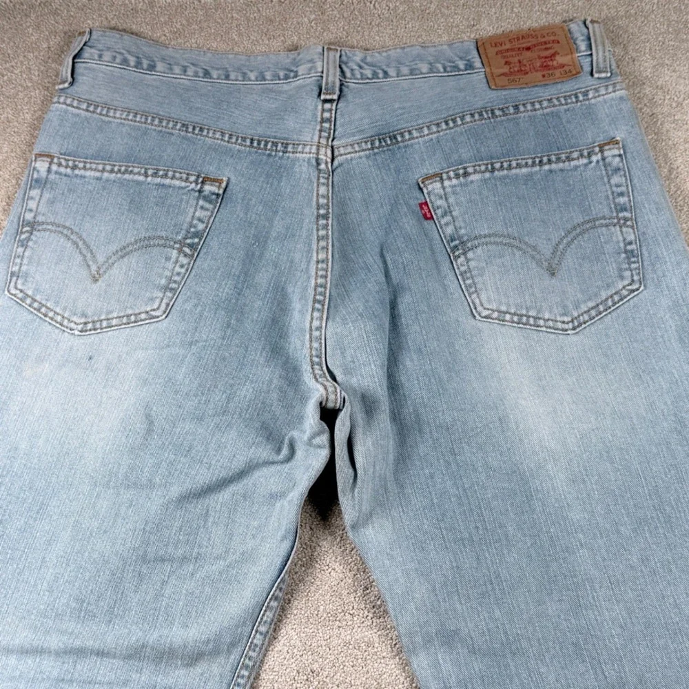 Levi's 567 Loose Boot Cut Jeans Mens 36x31 (tag 36x34) Light Wash Denim Blue Y2K